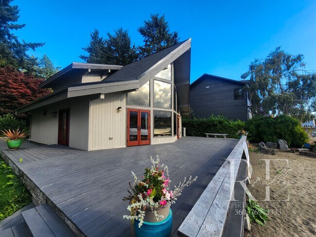 Building Photo - Waterfront Living in Indianola – Dock, Bea...