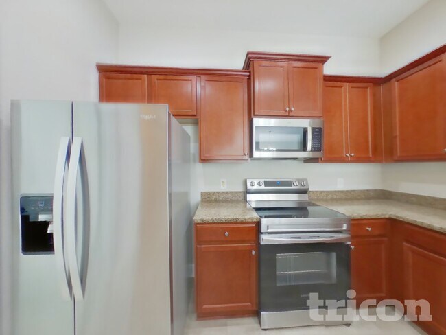 Building Photo - 6681 Freeport Dr