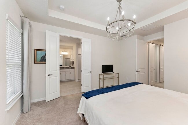 Building Photo - Introducing a captivating 3-story townhome...
