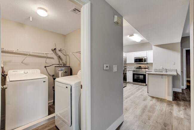 Building Photo - Upgrated upstairs 2 Bedrm 2 bath Gated Com...