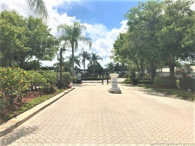 Building Photo - 3486 SW Pindo Palm Ln