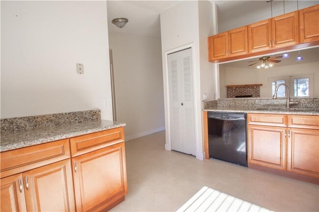 Building Photo - Freshly Painted 3/2 with Fenced Yard & Fireplace!