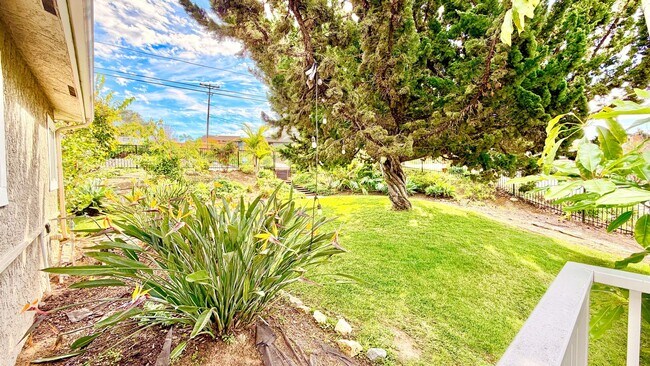 Building Photo - Beautiful Craftsman-style Home with fenced yard space, detached garage and additional parking in ...