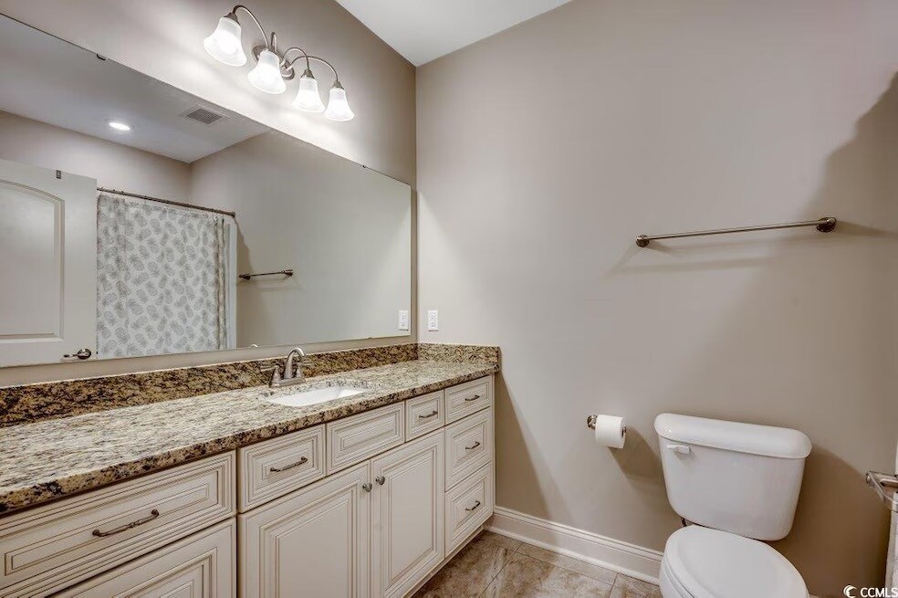 Primary Bathroom with large vanity - 144 Puffin Dr