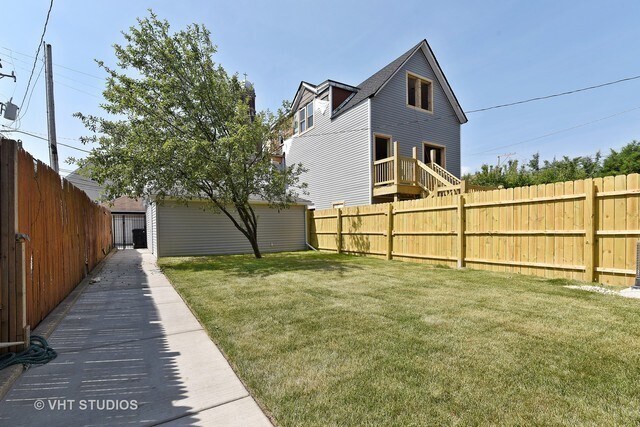 backyard south view with 2 car garage - 3625 W Oakdale Ave