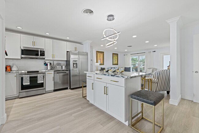 Updated cabinety and brand new S/S appliances - 1741 NW 39th St