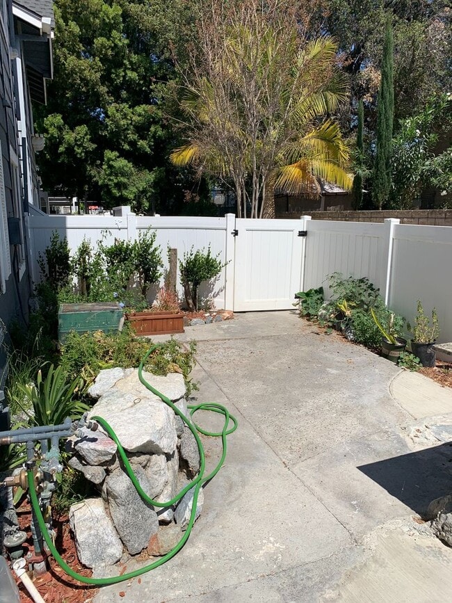 Building Photo - 1st floor 2+2 w/oversized patio, water + t...