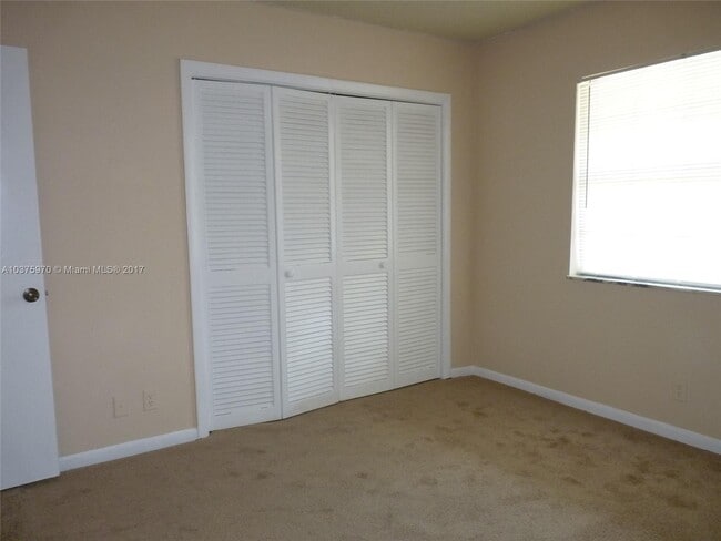 Building Photo - 3100 Coral Springs Dr