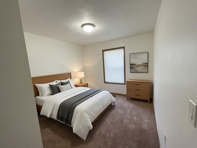 Building Photo - For Rent - 4 Bedroom, 2 Full Bath Home with Ground-Floor Bedroom, Attached Garage and Brand-New K...