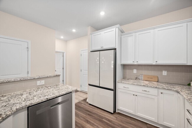 Building Photo - Stunning 3BD, 2.5BA End-Unit Fuquay-Varina Townhome with a 2-Car Garage in a Prime Location Near ...