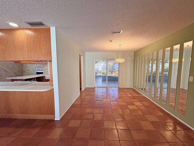 Building Photo - 3 Bed 2 Bath Home with Large Fenced Backyard & Screened Lanai — Available Now