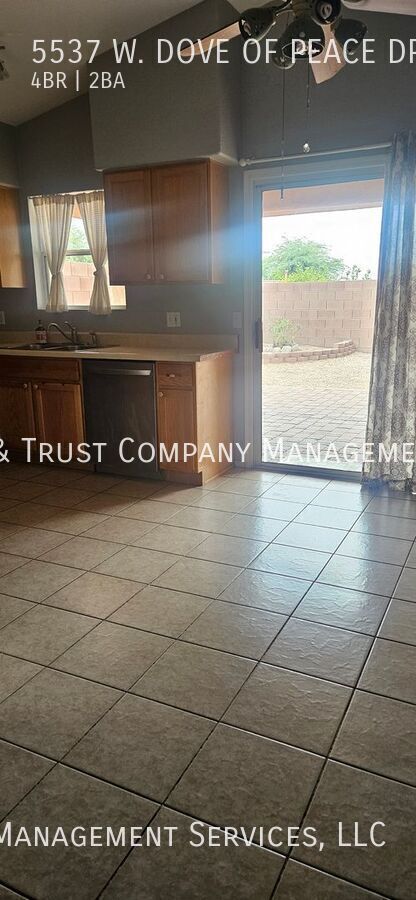 Building Photo - 5537 W Dove of Peace Dr