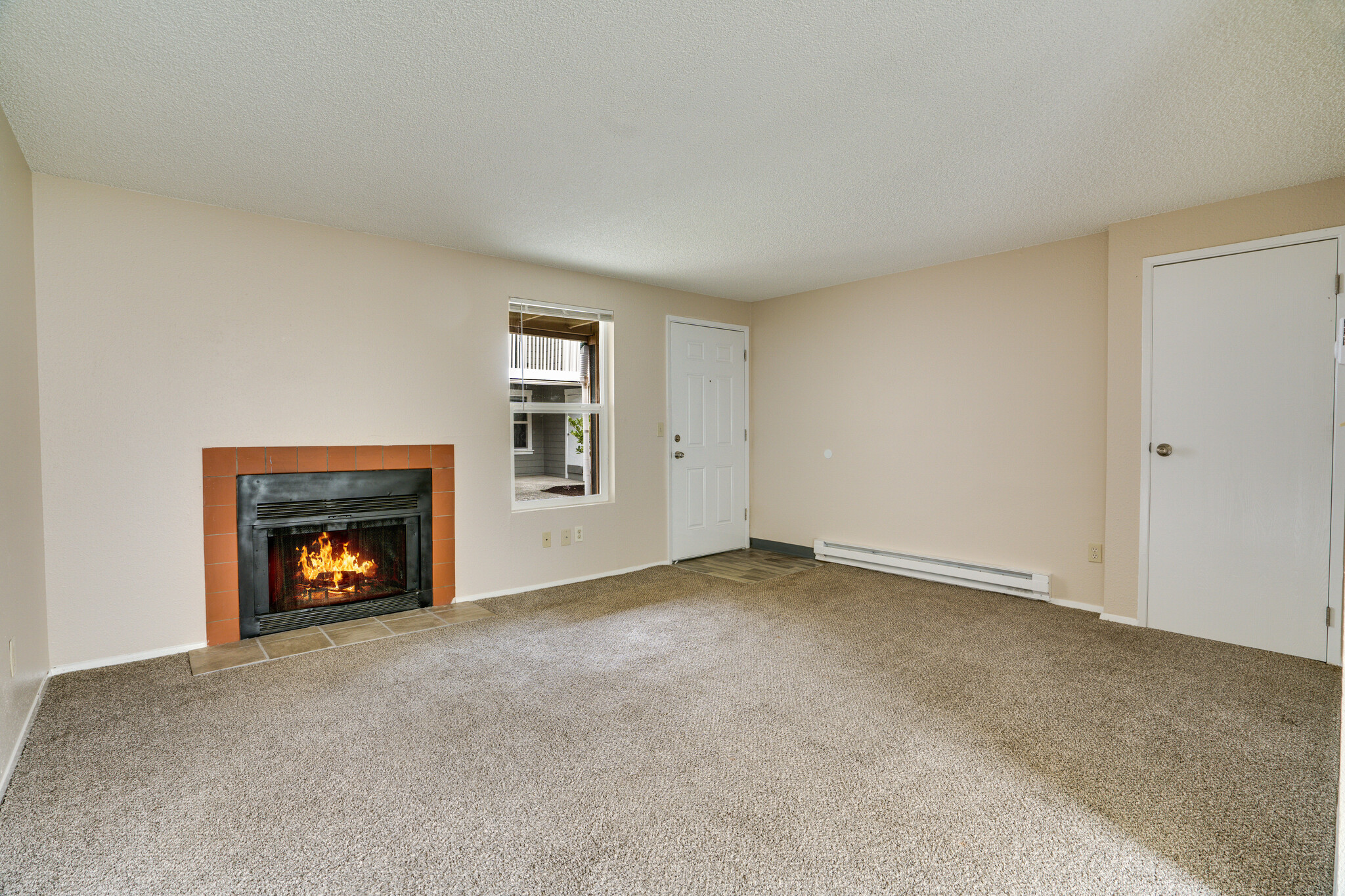 Living room with fireplace - 2410 S I St