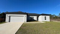Building Photo - Beautiful 3 Bedroom Palm Bay Home with Upgrades & No Water Bill!