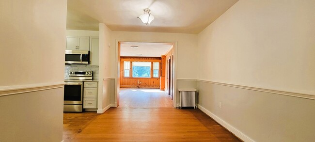 Building Photo - Remodeled brick bungalow with 1st floor li...
