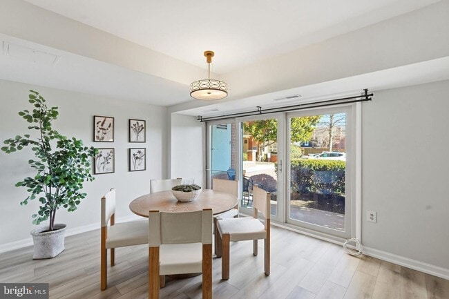 Building Photo - Welcome to this rarely available and beautifully updated ground-level condo offering the perfect ...