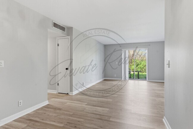 Building Photo - SPRING SPECIAL!! FIRST MONTH FREE on this Two Bedroom Condo, Garden Level with Washer/Dryer Hook ...