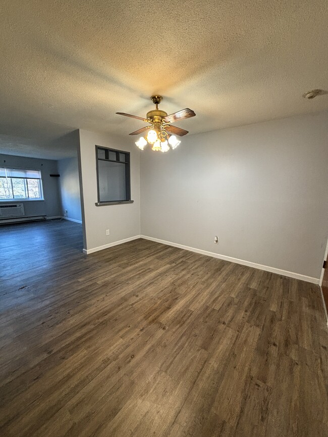 Dining room w view into living room - 5 Turnpike Rd