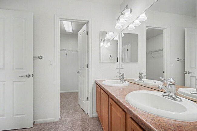 Building Photo - Beautifully Updated 3-Bedroom End-Unit Townhome Facing Open Space with Attached 2-Car Garage in G...