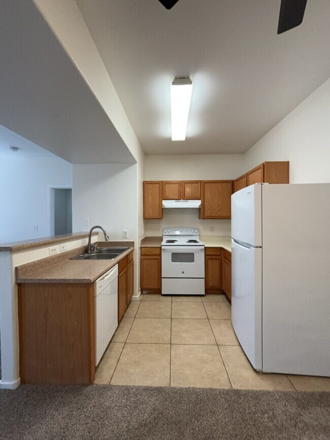 Building Photo - COZY 2 BEDROOM 2 FULL BATH CONDO LOCATED ON SECOND LEVEL