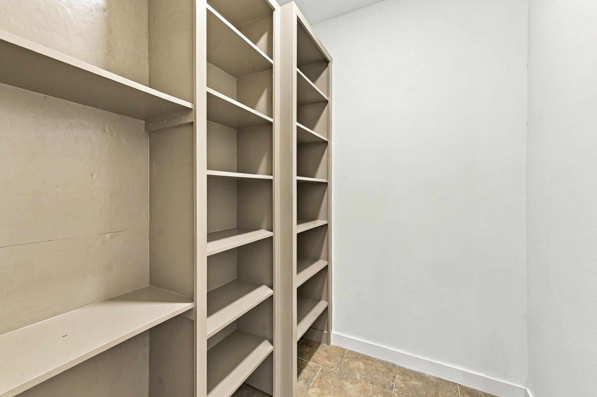 Oversized walk-in pantry with custom shelves - 8339 Carvel Ln