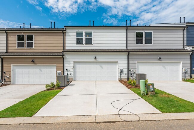 Building Photo - Like-New Townhome Walk to Downtown | Garage + Internet Included