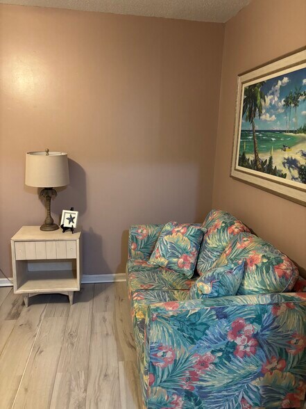 Couch in second bedroom extra seating. - 614 4th Ave S