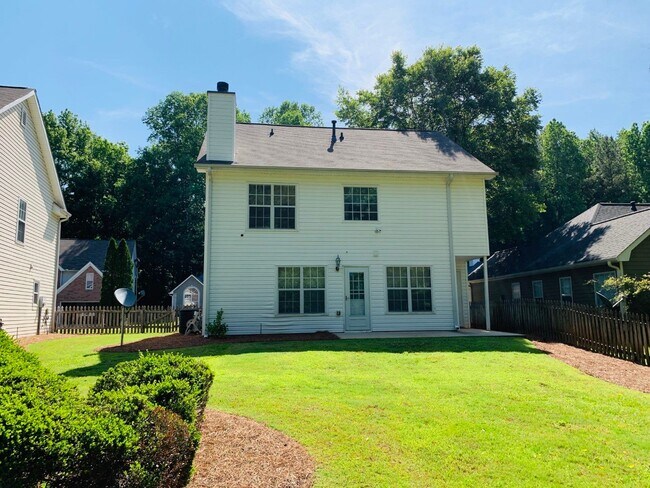 Building Photo - Great location! Lawncare/water is included...