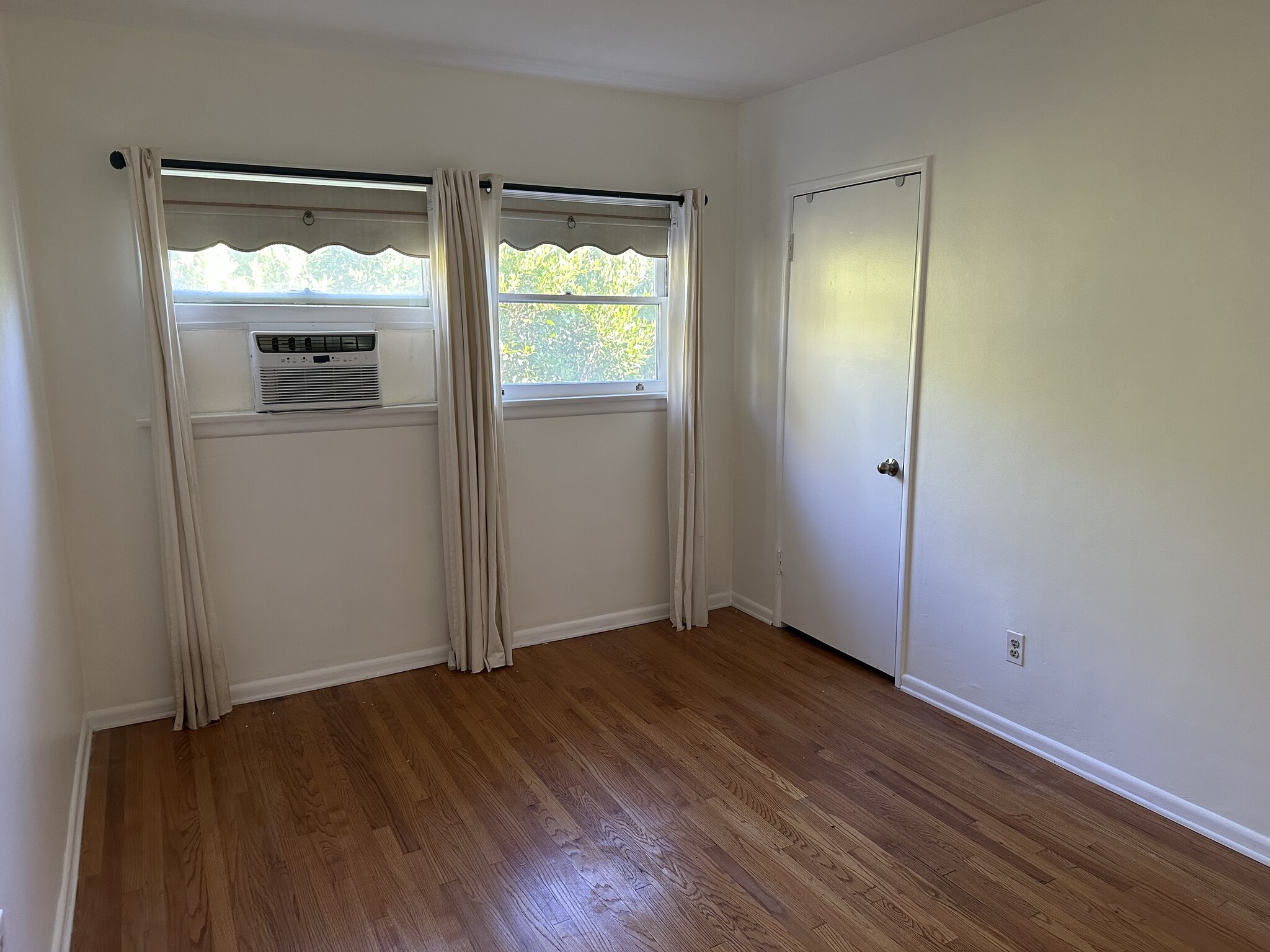 Bedroom with black out shades - 4680 College View Ave