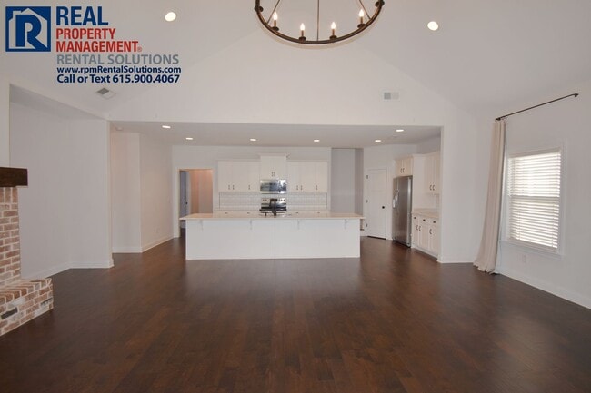 Building Photo - All brick 4 bedroom home plus Bonus room! Garage and covered patio!