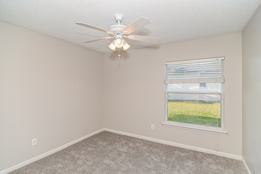 Building Photo - 7057 Rapid River Dr W
