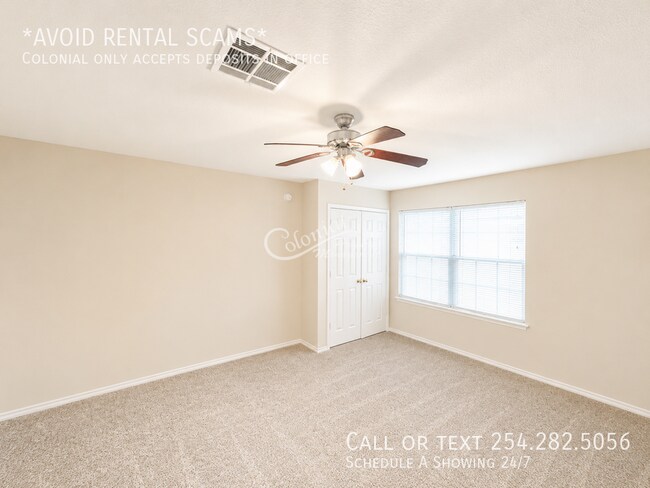 Building Photo - 5406 Boot Scootin Ct