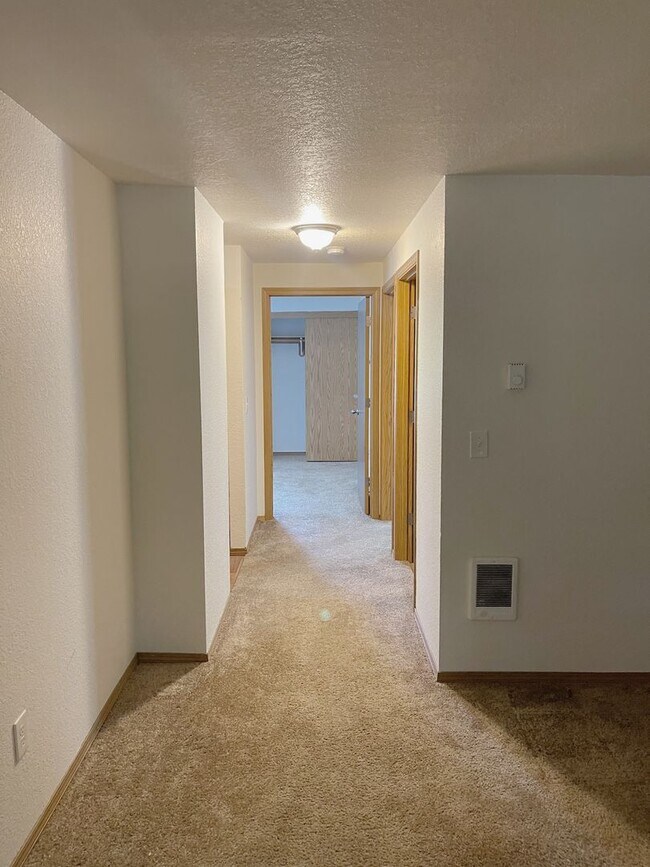 Building Photo - The Ultimate Living Experience - 2 Bedroom Top Floor Available!!