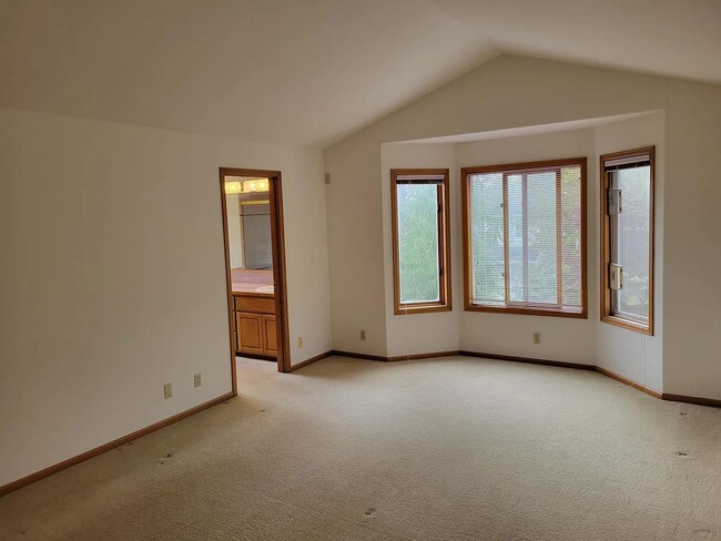 Building Photo - Spacious 3-Bedroom Home with Den and Priva...