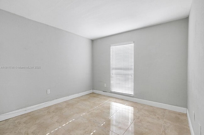 Building Photo - 241 S Royal Poinciana Blvd