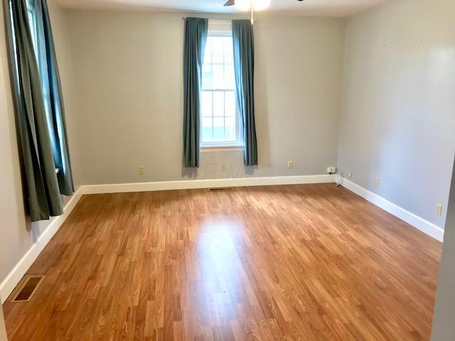 Living room where the front door leads into. - 711 E 6th Ave