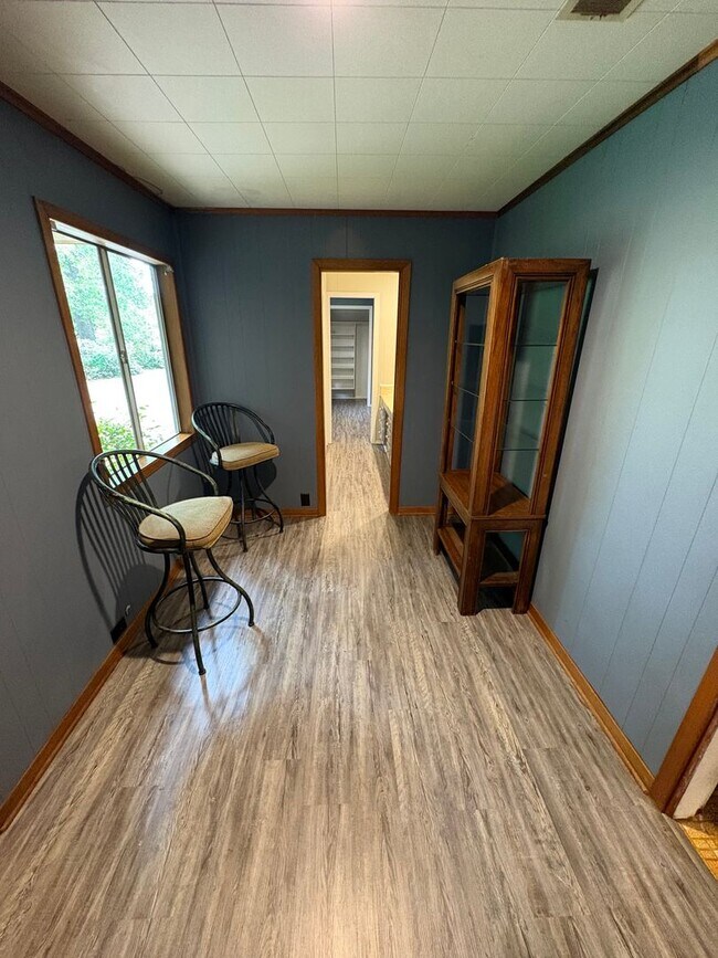 Building Photo - Storybook Cedar Home Down a Private Tree-Lined Drive