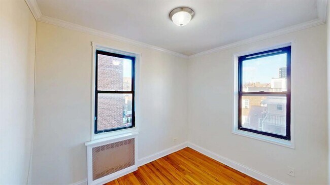 Building Photo - 66-15 Wetherole St