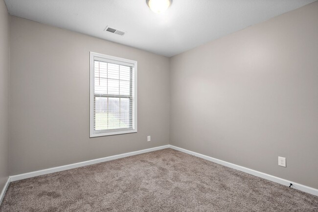 Building Photo - Pet Friendly Three Bedroom!