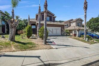 Building Photo - 6694 Cowboy St