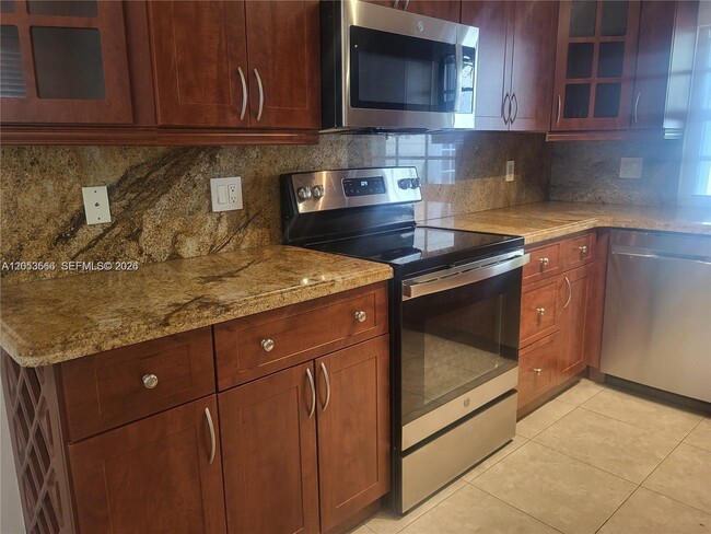 Building Photo - 14419 SW 142nd Ct