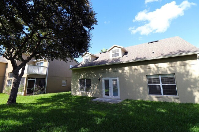Building Photo - Beautiful 4-Bedroom Home in Gated Golf Community – East Orlando