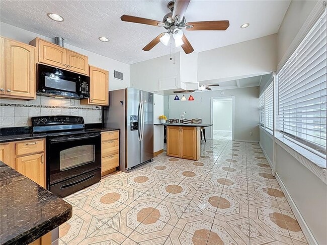Building Photo - 6709 Orchard Dr N