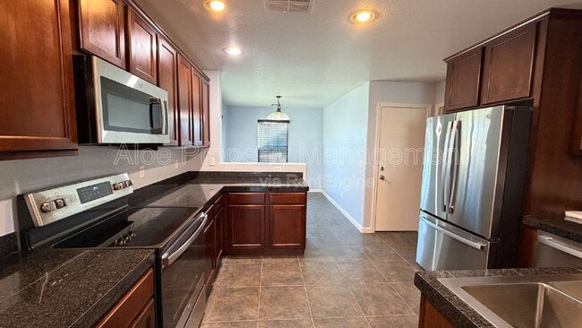 Building Photo - 36532 W Barcelona Ln