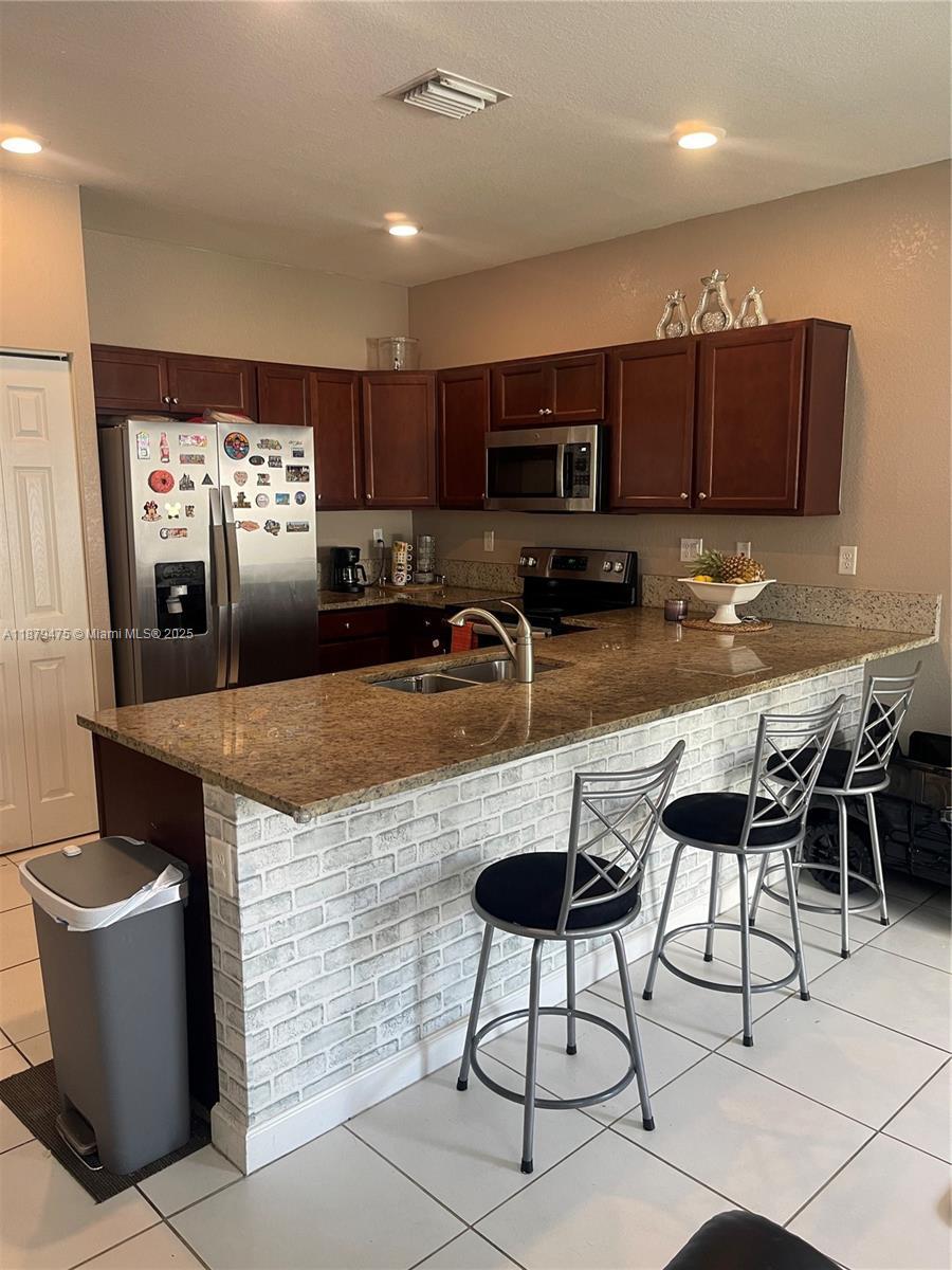 Building Photo - 9309 W 32nd Ln