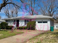 Building Photo - Move-In Ready 2 Bed Home with Sunroom, Garage & Fenced Yard