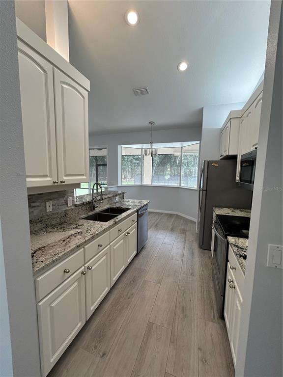 Building Photo - 5774 N Lamp Post Dr