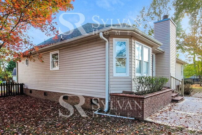 Building Photo - This lovely home is ready for your personal touch!