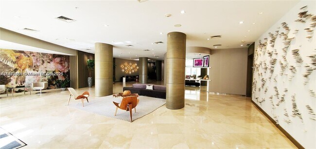 Building Photo - 10275 Collins Ave