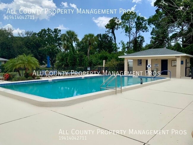 Building Photo - 7060 W Country Club Dr N